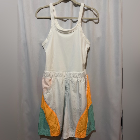 free people movement Pants - Free People Movement Double Bounce Onesie Size M NWOT Orange and Teal